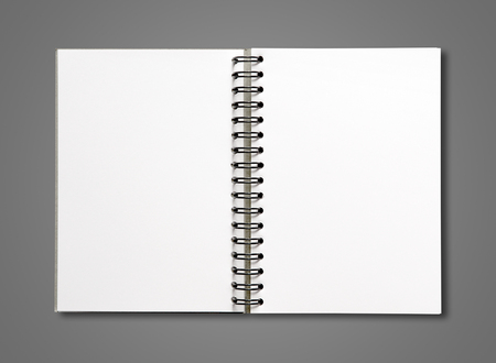 Blank open spiral notebook mockup isolated on dark greyの写真素材