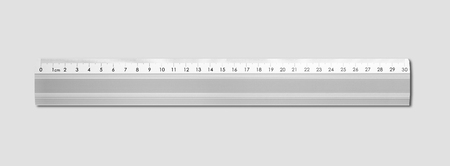 Steel metallic ruler isolated on grey backgroundの写真素材