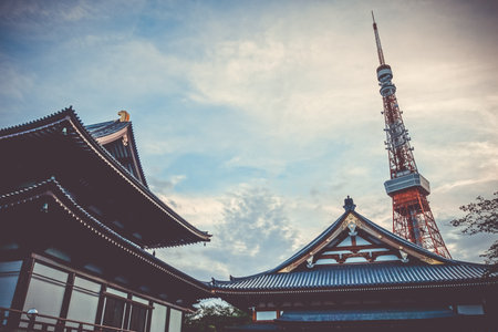 Zojo-ji temple and Tokyo tower at sunset, Japanのeditorial素材