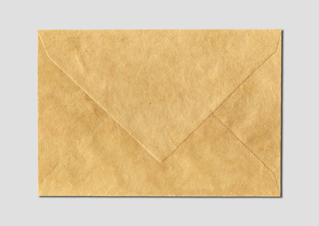 Brown paper enveloppe mockup template isolated on grey backgroundの写真素材