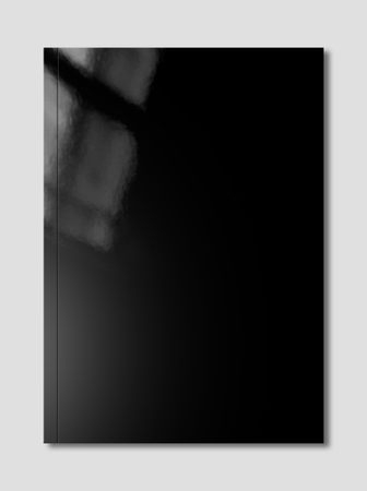 Black booklet cover isolated on grey background, mockup templateの写真素材