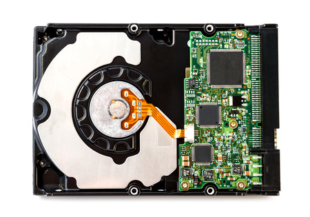 Opened hard disk drive isolated on white background