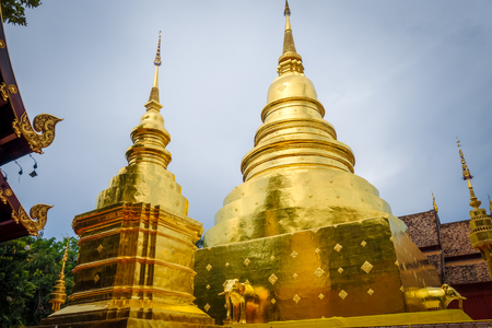 Wat Phra Singh golden stupa in Chiang Mai, Thailandの写真素材