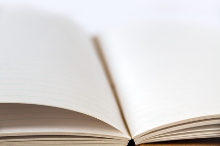 Open blank notebook mockup closeup view