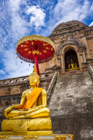 Gold Buddha, Wat Chedi Luang temple big Stupa in Chiang Mai, Thailandの写真素材