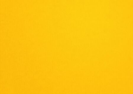 yellow paper texture background. clean blank wallpaperの写真素材