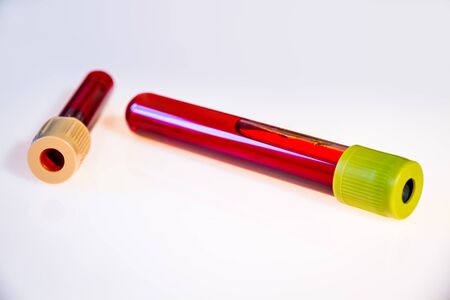 Two blood test tubes isolated on white backgroundの写真素材