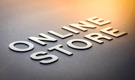 Word online store written with white solid letters on a boardの写真素材