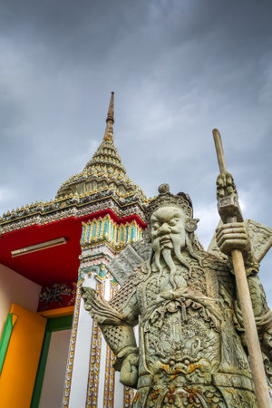 Chinese Guard statue in Wat Pho Buddhist temple, Bangkok, Thailandのeditorial素材