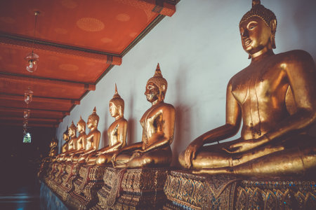 Buddha statues in Wat Pho Buddhist temple, Bangkok, Thailandのeditorial素材