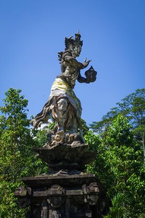 Statue in Pura Tirta Empul temple, Tampaksiring, Ubud, Bali, Indonesiaの写真素材