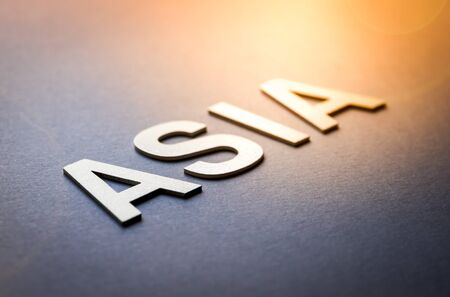 Word Asia written with white solid letters on a boardの写真素材