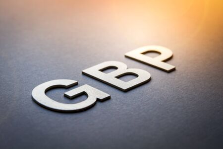 Word GBP written with white solid letters on a boardの写真素材