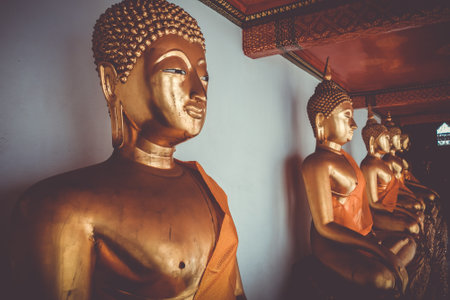 Buddha statues in Wat Pho Buddhist temple, Bangkok, Thailandのeditorial素材