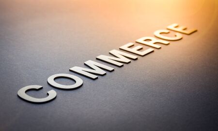 Word commerce written with white solid letters on a boardの写真素材