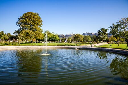 Aisles and pond of the Tuileries Garden in summer Paris, Franceの写真素材