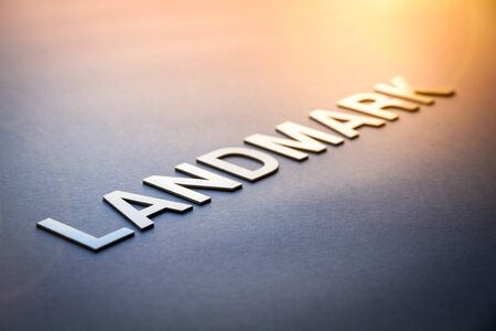 Word landmark written with white solid letters on a boardの写真素材