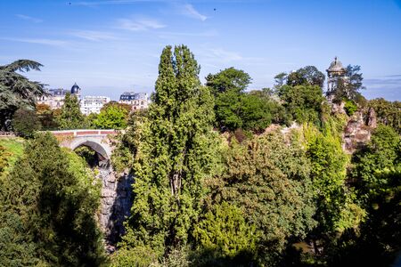 Sibyl temple and pond in Buttes-Chaumont Park, Paris, Franceの写真素材