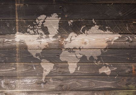 World map on a vintage wooden wallの写真素材