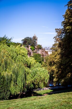 Sibyl temple and lake in Buttes-Chaumont Park, Paris, Franceの写真素材