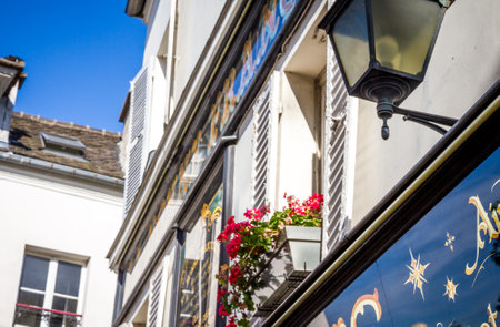PARIS/FRANCE - September 6, 2019 : Typical Parisian street and shops signs on Butte Montmartreのeditorial素材
