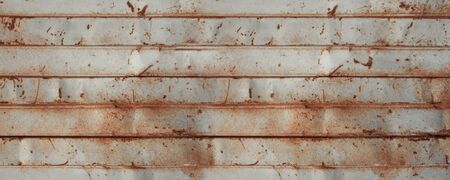 old rusty sheet metal wall, banner background wallpaperの写真素材