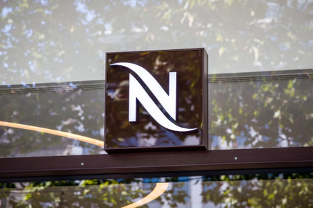 Paris/France - September 10, 2019 : The Nespresso coffee store entrance sign on Champs-Elysees avenueのeditorial素材