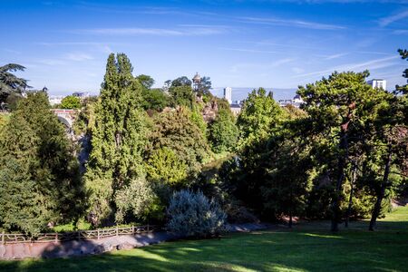 Sibyl temple and pond in Buttes-Chaumont Park, Paris, Franceの写真素材