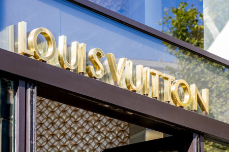 Paris/France - September 10, 2019 : The Louis Vuitton luxury store entrance sign on Champs-Elysees avenueのeditorial素材