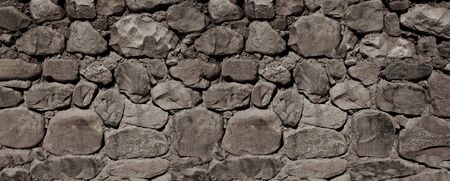 Old rough stone wall, banner background wallpaperの写真素材