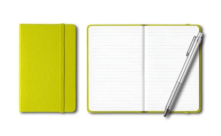 Lime green closed and open lined notebooks with a pen isolated on whiteの写真素材