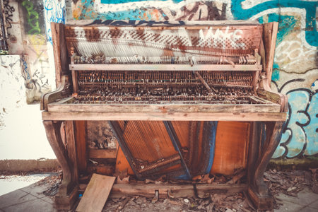 Bordeaux/France - April 18, 2018 : Broken piano and Graffitis in Darwin old buildings, Caserne Niel.のeditorial素材