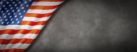 USA flag on concrete wall. Horizontal panoramic banner.の写真素材