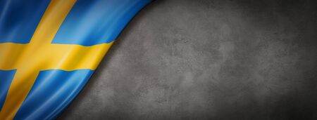 Sweden flag on concrete wall. Horizontal panoramic banner. 3D illustrationの写真素材