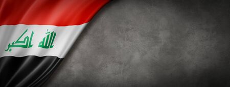 Iraq flag on concrete wall. Horizontal panoramic banner. 3D illustrationの写真素材