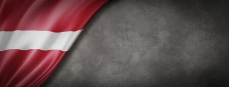 Latvia flag on concrete wall. Horizontal panoramic banner. 3D illustrationの写真素材