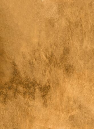 Brown leather drum skin background texture. Closeup viewの写真素材