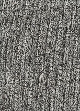 Grey mottled wool texture background. Close up fabric wallpaperの写真素材