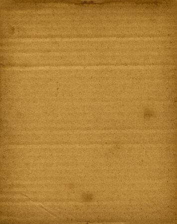 Old brown corrugated cardboard texture background wallpaperの写真素材