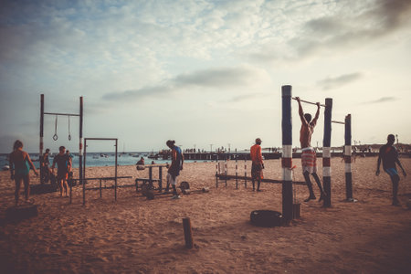 Santa Maria/Cape Verde - August 22, 2018 - Fitness training on beach at sunset, Salのeditorial素材