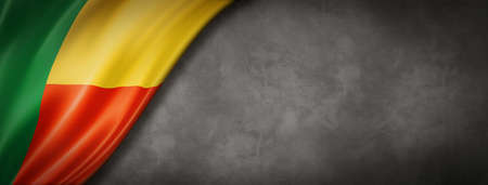 Benin flag on concrete wall. Horizontal panoramic banner. 3D illustrationの写真素材