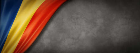 Chad flag on concrete wall. Horizontal panoramic banner. 3D illustrationの写真素材