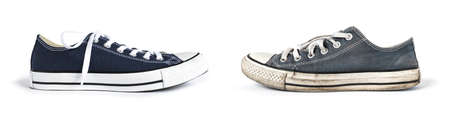 New and old blue generic sneakers isolated on white backgroundの写真素材