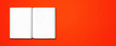 Open book isolated on a red banner backgroundの写真素材