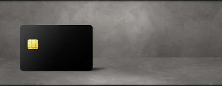 Black credit card template on a concrete background banner. 3D illustrationの写真素材
