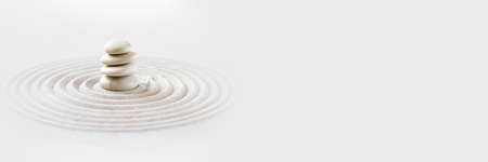 White stones pile in the sand. Zen japanese garden background scene. Horizontal banner