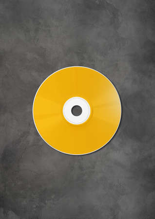 Yellow CD - DVD label mockup template isolated on concrete background