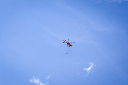 Pralognan/France - August 10, 2020 : Mountain rescue helicopter in the sky, Vanoise national Park, french alpsのeditorial素材