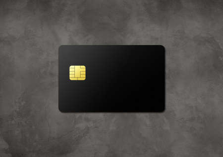 Black credit card template on a dark concrete background. 3D illustrationの写真素材