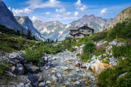 Pralognan/France - August 10, 2020 : Mountain hut of the Barmettes and river in Vanoise national Parkのeditorial素材